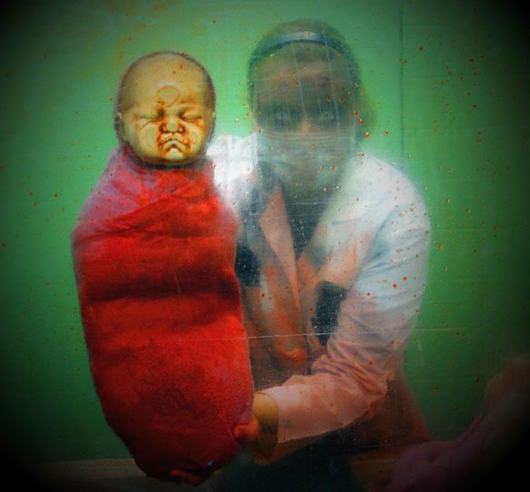 Maternity doctor with scarey baby